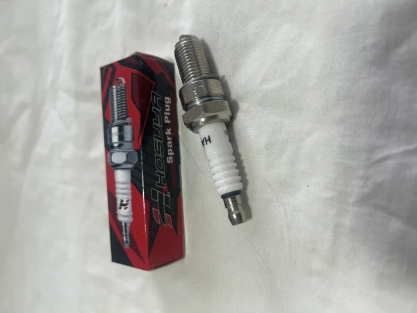 Bujía corta's foto | Motoparts |  BizneCubano